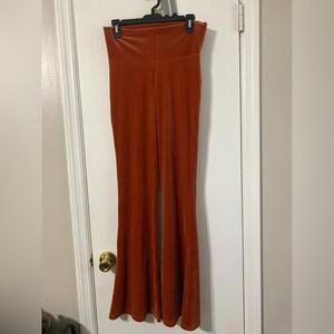 Home cooked karma orange velvet flair pants